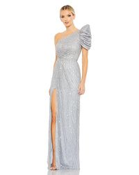 This beautiful silver sequin, one-shoulder, asymmetric floor-length, evening gown with a beautiful cinched waist and puff detail on the shoulder is an elegant gown for special occasions and events with one thigh high split and an elegant form-fitting fit. 