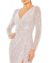 This stunning Mac Duggal elegant long-sleeved, lavender, evening gown is a beautiful, full-length evening dress with faux-wrap detail and all over sequins. With one sexy-thigh high split, dress is perfect for proms, weddings and special events! close up