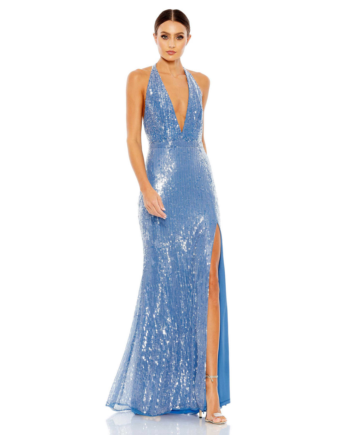 This sexy Mac Duggal, floor-length, sequinned cerulean/aqua blue evening gown is a super-sexy, black-tie dress for that special occasion! With a plunging V neck and a super sexy low-back with tie-up detail, this evening dress is for the daring! Perfect for prom, after-parties and weddings, you will certainly have all eyes on you! 